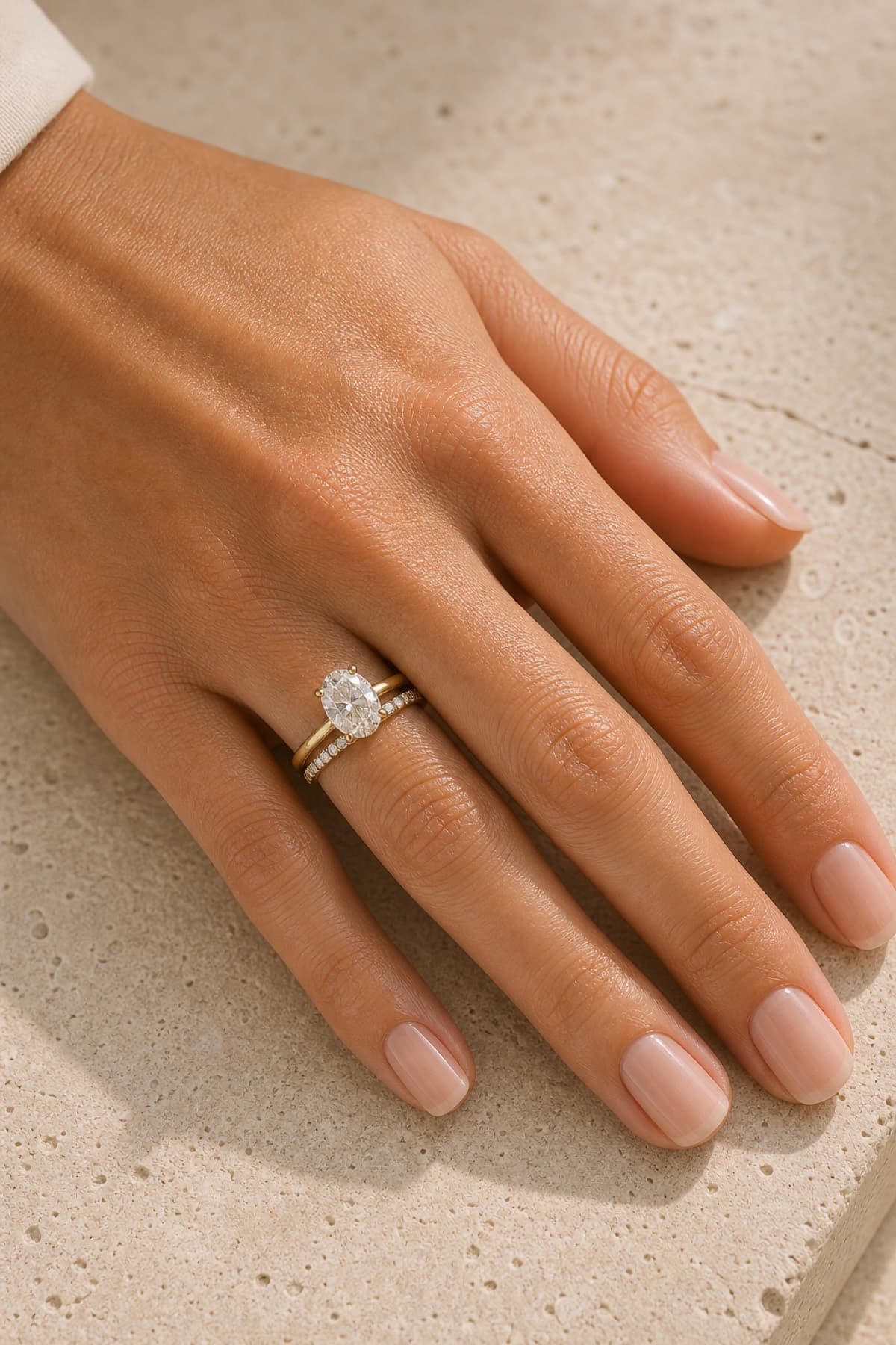 Wedding bands compared side by side at a private San Diego jeweler's desk